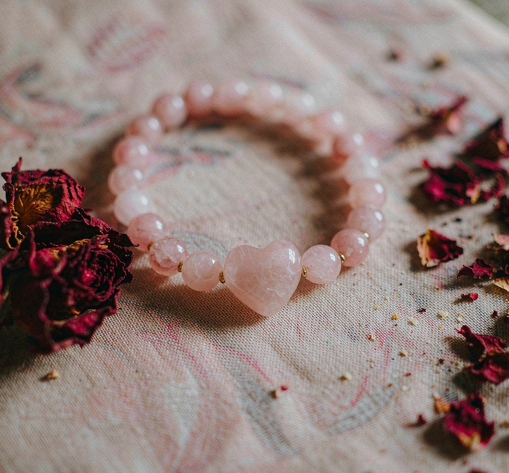 Rose quartz love bracelet with dried roses
